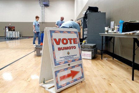 Clark County election department workers set up an early voting polling site in Las Vegas