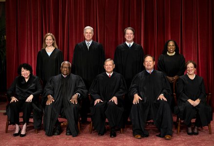 U.S. Supreme Court justices pose for their group portrait at the Supreme Court in Washington