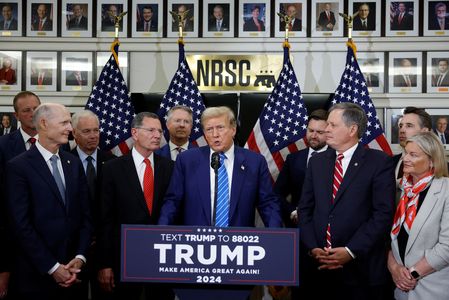 Republican presidential candidate Trump speaks to the media following meetings with Republicans on Capitol Hill, in Washington