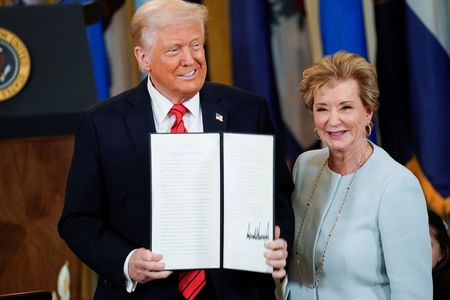 U.S. President Donald Trump signs an executive order to shut down the Department of Education