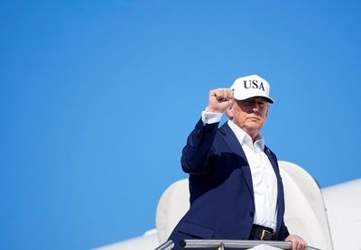 U.S. President Donald Trump boards Air Force One at Morristown Airport