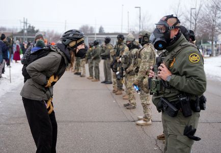 People protest against the fatal shooting of Renee Nicole Good by an ICE agent, in Minneapolis