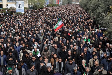 People attend Friday prayer in Tehran