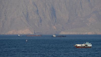 FILE PHOTO: Tankers and other vessels in the Strait of Hormuz off the coast of Musandam